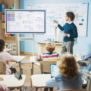 Elementary,School,Science,Teacher,Uses,Interactive,Digital,Whiteboard,To,Show